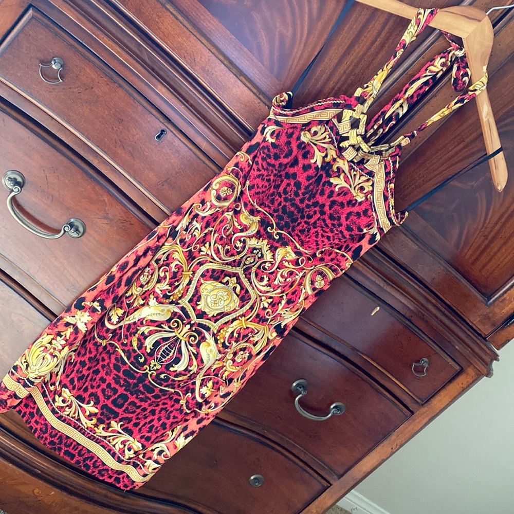 Flattering and sexy halter Arden B dress. Never worn. Metallic detail.